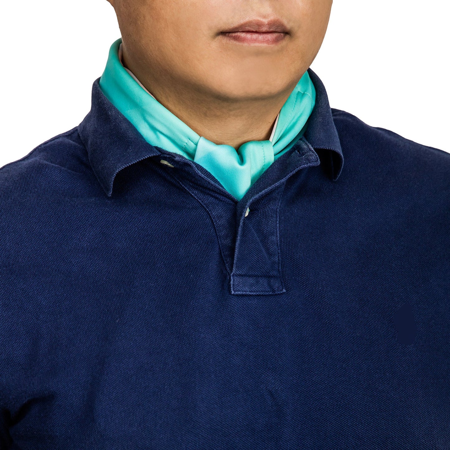 Cooling neck scarf with peaks pattern worn discreetly under a polo shirt for hot-weather casual comfort